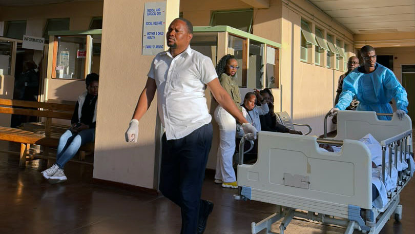 Health personnel attend to injured pupils at Nazarene Hospital after they were struck by a kombi that allegedly lost its brakes near the Manzini Bus Rank.